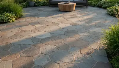 Flagstone patio with natural stone pavers expertly installed by landscaping pros in Oak Park, IL